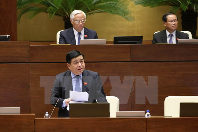 Bộ trưởng Bộ Kế hoạch và Đầu tư Dương Chí Dũng phát biểu giải trình. (Ảnh: Doãn Tấn/TTXVN)