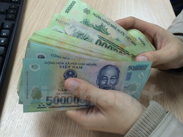 Nhiều địa phương đã có phương án thưởng Tết năm 2017. (Ảnh minh họa:PV/Vietnam+)