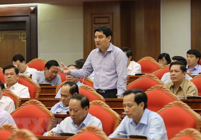 Đồng chí Nguyễn Đắc Vinh, Ủy viên Trung ương Đảng, Bí thư tỉnh ủy Nghệ An phát biểu thảo luận Đề án cải cách chính sách tiền lương. (Ảnh: Phương Hoa/TTXVN)