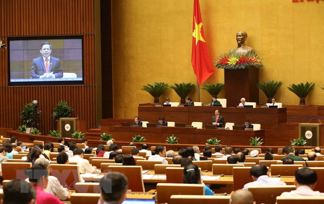 Bộ trưởng Bộ Giao thông Vận tải Nguyễn Văn Thể trả lời chất vấn. (Ảnh: Doãn Tấn/TTXVN)