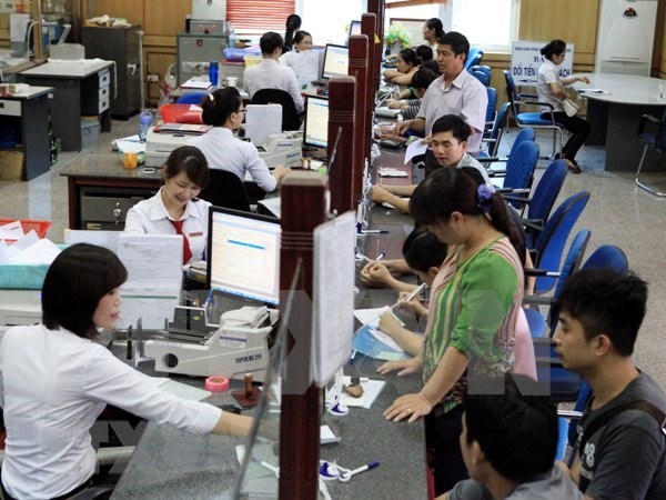 Giao dịch tại Agribank. (Nguồn: TTXVN)