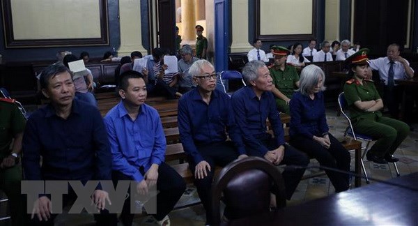 Các bị cáo tại phiên tòa ngày 28-11. (Ảnh: Thành Chung/TTXVN)