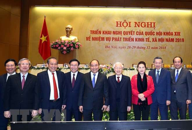 Tổng Bí thư, Chủ tịch nước Nguyễn Phú Trọng, Thủ tướng Nguyễn Xuân Phúc, Chủ tịch Quốc Hội Nguyễn Thi Kim Ngân và các đại biểu. (Ảnh: Thống Nhất/TTXVN)