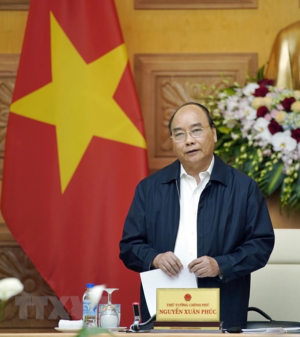 Thu tuong Nguyen Xuan Phuc lam viec voi cac chuyen gia, nha khoa hoc hinh anh 1Thủ tướng Nguyễn Xuân Phúc, Trưởng Tiểu ban kinh tế-xã hội phát biểu. (Ảnh: Thống Nhất/TTXVN)