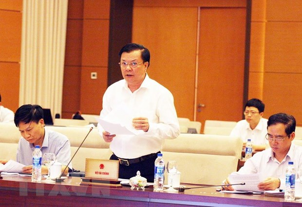 Chi ngan sach Nha nuoc duoc kiem soat chat che, hieu qua hon hinh anh 2Bộ trưởng Bộ Tài chính Đinh Tiến Dũng phát biểu. (Ảnh: Nguyễn Dân/TTXVN)