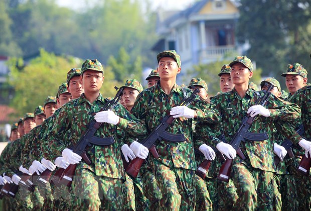 Phat huy tinh than doc lap, tu chu, quyet chien, quyet thang hinh anh 3Khối Chiến sĩ Bộ Chỉ huy Bộ đội Biên phòng tỉnh Điện Biên diễu binh tại lễ kỷ niệm 65 năm Chiến thắng Điện Biên Phủ, ngày 6/5. (Ảnh: Xuân Tư/TTXVN)
