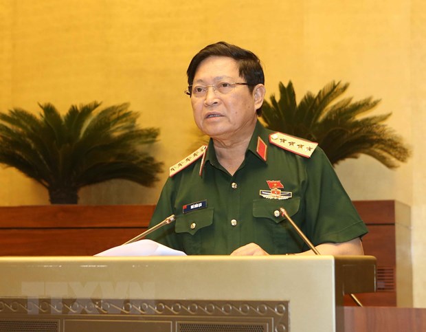 Đại tướng Ngô Xuân Lịch, Bộ trưởng Bộ Quốc phòng giải trình ý kiến của đại biểu Quốc hội. (Ảnh: Doãn Tấn/TTXVN)