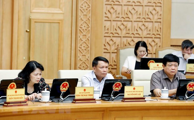 Thu tuong: Nen kinh te Viet Nam van duy tri toc do tang truong hinh anh 2Các thành viên Chính phủ và khách mời tham dự phiên họp. (Ảnh: Thống Nhất/TTXVN)