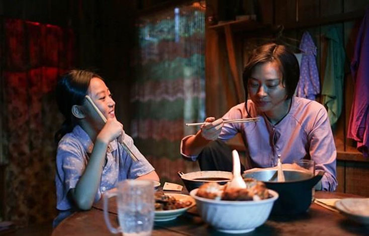  "Đả nữ " Ngô Thanh Vân vào vai bà mẹ đơn thân trong phim  "Hai Phượng. " (Ảnh: Đoàn làm phim)