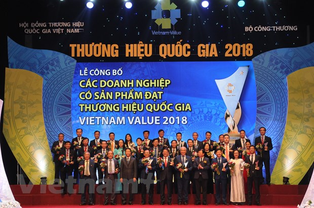 Các doanh nghiệp có sản phẩm đạt Thương hiệu quốc gia năm 2018. (Ảnh: Đức Duy/Vietnam+)
