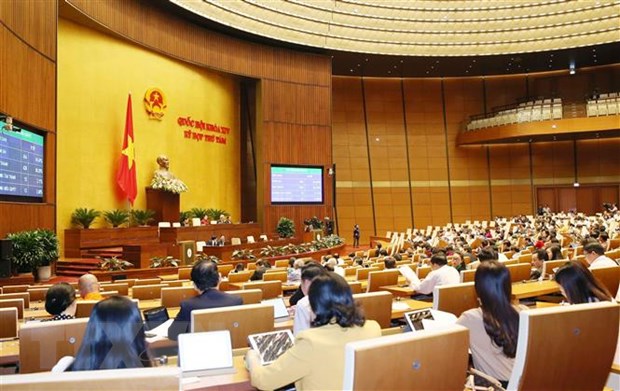 Chinh thuc thong qua Luat Can bo, cong chuc va Luat Vien chuc hinh anh 3Quốc hội biểu quyết thông qua toàn văn Luật sửa đổi, bổ sung một số điều của Luật Cán bộ, công chức và Luật Viên chức. (Ảnh: Phương Hoa/TTXVN)