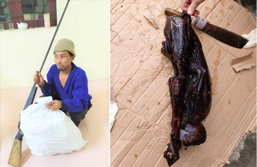 Ông Cao Xuân Việt cùng tang vật vụ việc.