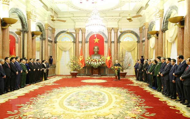 Tổng Bí thư, Chủ tịch nước Nguyễn Phú Trọng chúc Tết các đồng chí lão thành Cách mạng, các đồng chí lãnh đạo, nguyên lãnh đạo Đảng, Nhà nước, Mặt trận Tổ quốc Việt Nam, cán bộ lãnh đạo các cơ quan Trung ương và Hà Nội cùng toàn thể đồng chí, đồng bào, chiến sĩ cả nước, người Việt Nam ở nước ngoài. (Ảnh: Phương Hoa/TTXVN)
