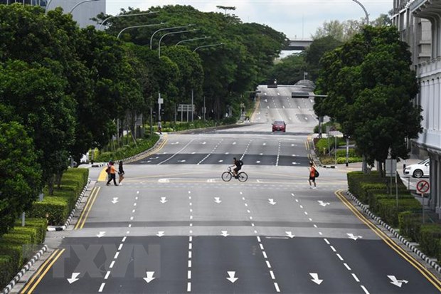  Cảnh vắng vẻ trên đường phố tại Singapore ngày 7-4-2020 trong bối cảnh dịch COVID-19 lan rộng. (Nguồn: THX/TTXVN)