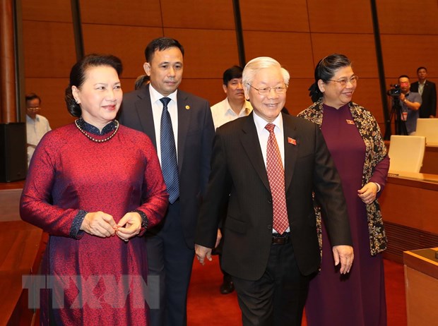 Tổng Bí thư, Chủ tịch nước Nguyễn Phú Trọng, Chủ tịch Quốc hội Nguyễn Thi Kim Ngân dự phiên khai mạc. (Ảnh: TTXVN)
