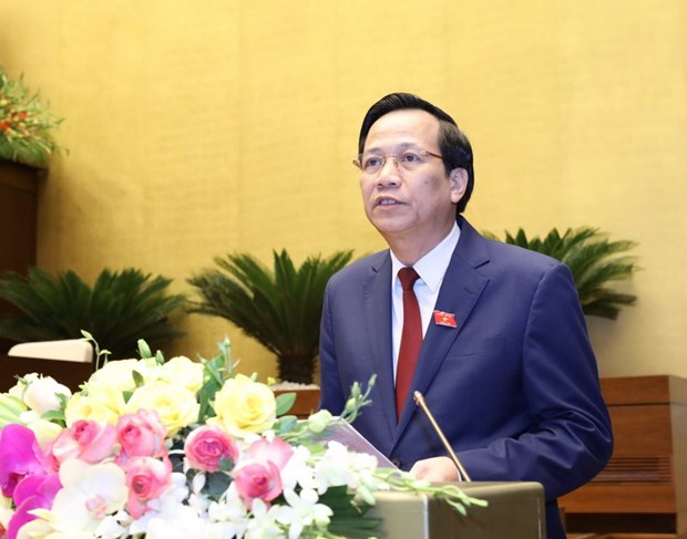 Thừa ủy quyền của Thủ tướng Chính phủ, Bộ trưởng Bộ Lao động - Thương binh và Xã hội Đào Ngọc Dung trình bày Báo cáo thuyết minh việc gia nhập Công ước số 105 của Tổ chức Lao động Quốc tế về xóa bỏ lao động cưỡng bức. (Ảnh: Văn Điệp/TTXVN)