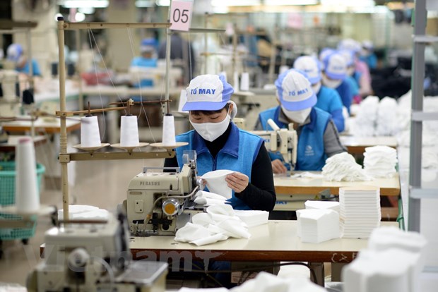 Doanh nghiệp đẩy mạnh sản xuất sau dịch COVID-19. (Ảnh: Đức Duy/Vietnam+)