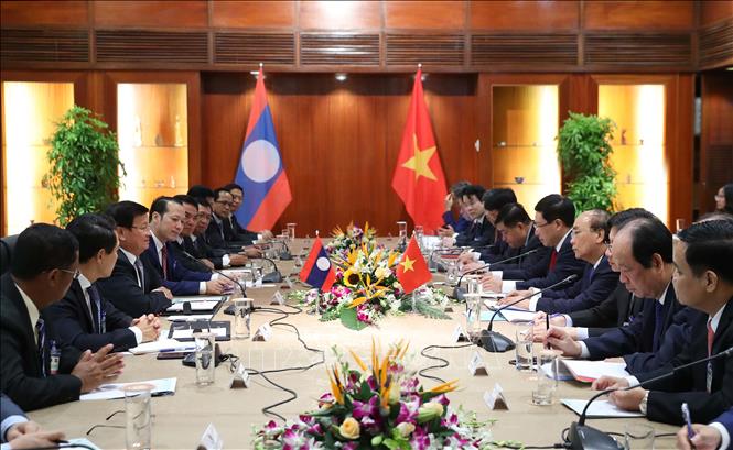  Thủ tướng Nguyễn Xuân Phúc hội đàm Thủ tướng Lào Thongloun Sisoulith. Ảnh: Thống Nhất/TTXVN