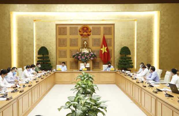 Phó Thủ tướng Chính phủ Vũ Đức Đam, Trưởng ban Chỉ đạo Quốc gia phòng, chống dịch COVID-19 chủ trì cuộc họp. (Ảnh: Doãn Tấn/TTXVN)