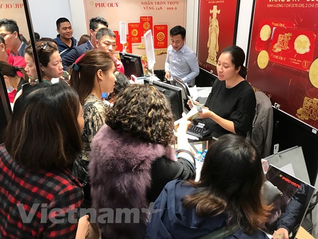 Giao dịch vàng tại doanh nghiệp. (Ảnh: PV/Vietnam+)
