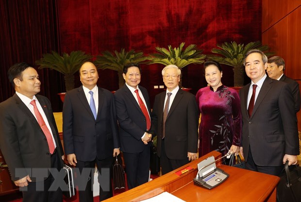 Tổng Bí thư, Chủ tịch nước Nguyễn Phú Trọng, Thủ tướng Chính phủ Nguyễn Xuân Phúc, Chủ tịch Quốc hội Nguyễn Thị Kim Ngân và các đại biểu dự bế mạc Hội nghị. (Ảnh: Trí Dũng/TTXVN)