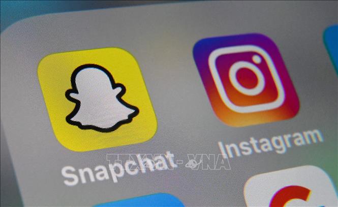 Biểu tượng của Snapchat trên màn hình máy tính bảng. Ảnh: AFP/TTXVN