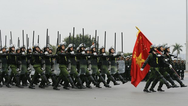 Các lực lượng xuất quân, triển khai các phương án, huy động phương tiện, huấn luyện võ thuật, diễn tập giải quyết các tình huống gây rối, các trường hợp tụ tập kích động tại các mục tiêu được bảo vệ. (Ảnh: Doãn Tấn/TTXVN)