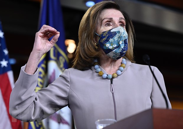 Chủ tịch Hạ viện Mỹ Nancy Pelosi kêu gọi phế truất ông Trump. (Ảnh: AFP/TTXVN)