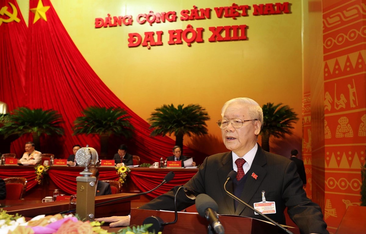 Đồng chí Nguyễn Phú Trọng, Tổng Bí thư Ban Chấp hành Trung ương Đảng, Chủ tịch nước CHXHCN Việt Nam đọc Báo cáo chính trị của Ban Chấp hành Trung ương Đảng khóa XII và các văn kiện trình Đại hội. (Ảnh: TTXVN)