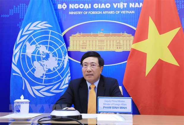 Phó Thủ tướng, Bộ trưởng Bộ Ngoại giao Phạm Bình Minh dự cuộc họp cấp cao của Hội đồng Bảo an Liên hợp quốc về bảo đảm sự tiếp cận vắcxin COVID-19 một cách công bằng. (Ảnh: Lâm Khánh/TTXVN)