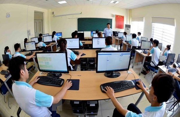 Sinh viên trong giờ học công nghệ thông tin. (Ảnh minh họa: Thanh Hà/TTXVN)