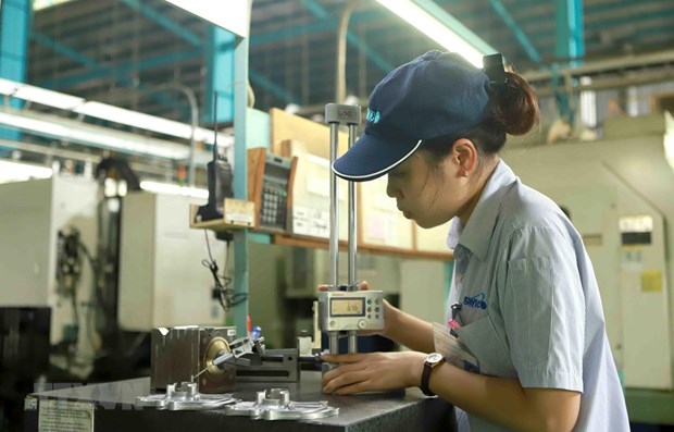 Hoạt động sản xuất tại một doanh nghiệp ở tỉnh Vĩnh Phúc. (Ảnh: Hoàng Hùng/TTXVN)