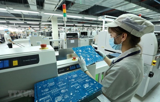 Hoạt động sản xuất tại một doanh nghiệp. (Ảnh: Minh Quyết/TTXVN)