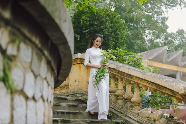  Thiếu nữ Hà thành trong trang phục áo dài. (Nguồn: Vietnam+)
