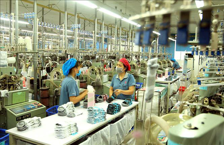 Truyền thông Malaysia nhận định, Việt Nam sẽ duy trì đà phát triển bất chấp ảnh hưởng của dịch COVID-19. Ảnh minh họa: An Đăng/TTXVN