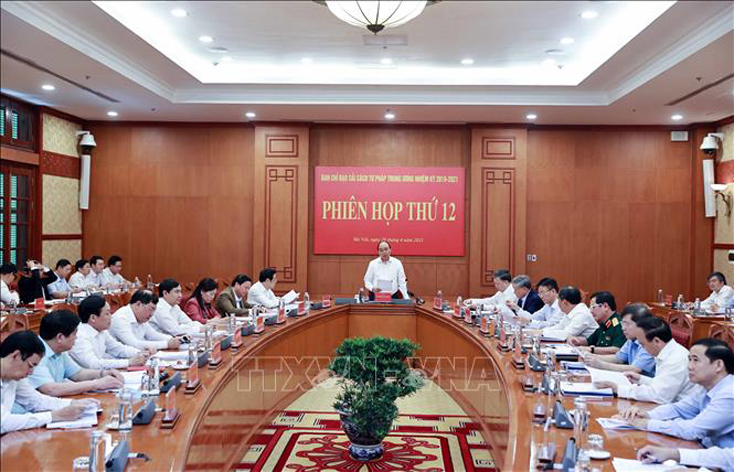Chủ tịch nước Nguyễn Xuân Phúc, Trưởng Ban Chỉ đạo Cải cách Tư pháp Trung ương phát biểu. Ảnh: Thống Nhất/TTXVN