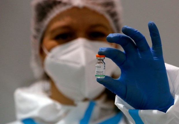 WHO cấp phép sử dụng khẩn cấp vaccine ngừa COVID-19 của Sinopharm. (Nguồn: AP)