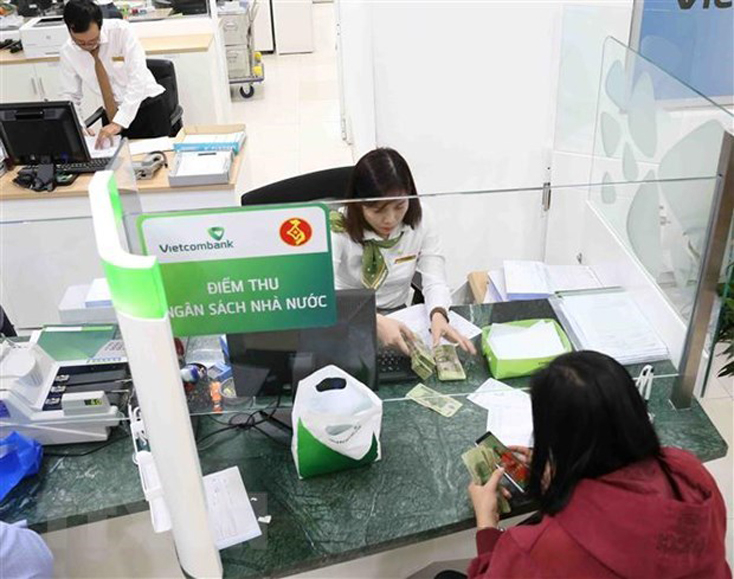 Bộ Tài chính cho biết thời gian tới sẽ xây dựng quy trình thu ngân sách nhà nước thông qua mã định danh khoản thu. Ảnh minh họa: Vũ Sinh/TTXVN