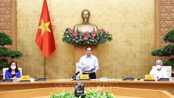 Thủ tướng Phạm Minh Chính chủ trì phiên họp lần thứ nhất của Hội đồng và phát động phong trào thi đua đặc biệt “Cả nước đoàn kết, chung sức, đồng lòng, thi đua phòng chống và chiến thắng đại dịch COVID-19”, ngày 14-8-2021. Ảnh: Dương Giang/TTXVN