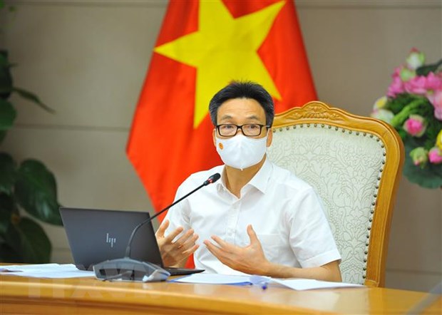 Phó Thủ tướng Vũ Đức Đam chủ trì cuộc họp. (Ảnh: Minh Đức/TTXVN)
