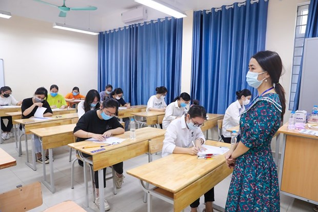 Thí sinh dự thi tốt nghiệp trung học phổ thông. (Ảnh: Minh Sơn/Vietnam+)
