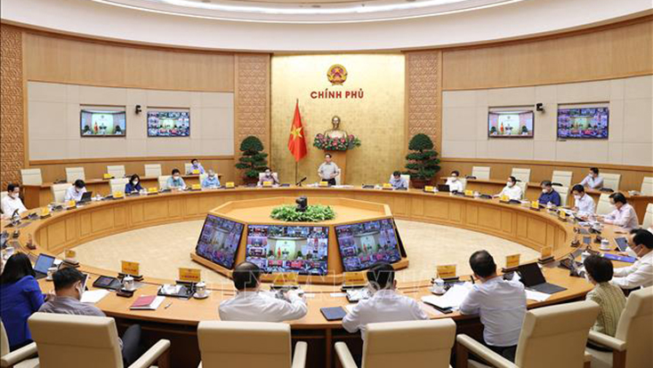 Quang cảnh cuộc họp tại điểm cầu Chính phủ. Ảnh: Dương Giang/TTXVN