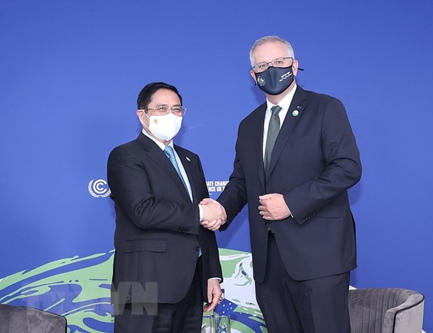 Thủ tướng Phạm Minh Chính gặp Thủ tướng Australia Scott Morrison. (Ảnh: Dương Giang/TTXVN)