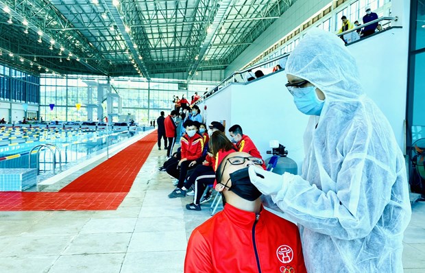 Nhân viên y tế làm công tác xét nghiệm. (Ảnh: TTXVN/Vietnam+)