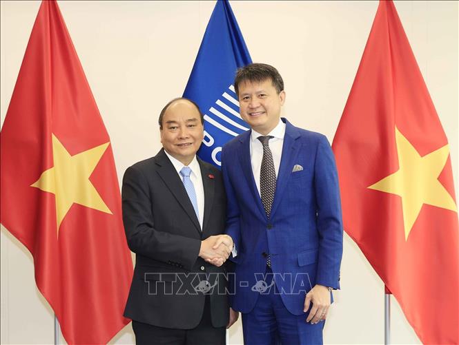 Chủ tịch nước Nguyễn Xuân Phúc với Tổng giám đốc Tổ chức Sở hữu trí tuệ thế giới (WIPO) Daren Tang. Ảnh: Thống Nhất/TTXVN