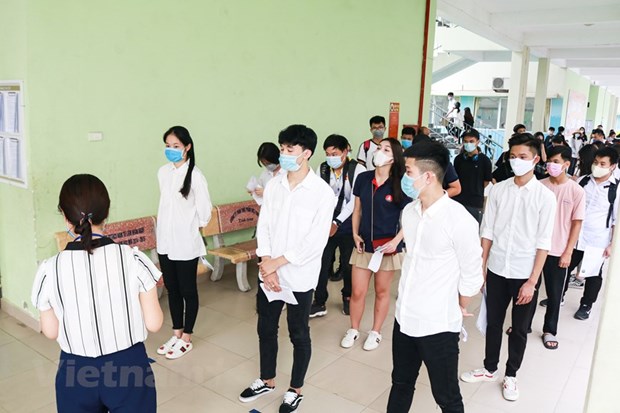  Thí sinh dự tốt nghiệp trung học phổ thông. (Ảnh: PV/Vietnam+)
