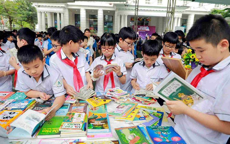   Học sinh Trường tiểu học Achimedes hào hứng với Ngày hội Ðọc sách năm 2021. (Ảnh chụp trước đợt bùng phát dịch Covid-19 lần thứ 4)