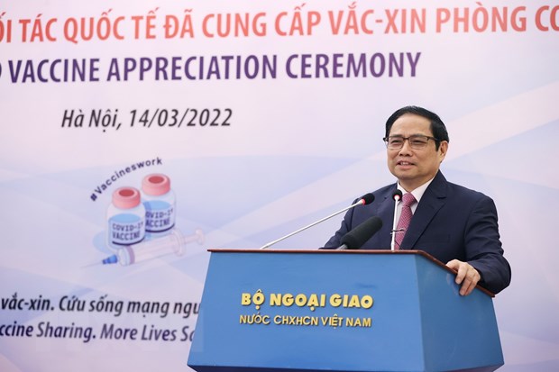 Thủ tướng Phạm Minh Chính cảm ơn các đối tác quốc tế đã hỗ trợ vaccine phòng COVID-19 cho Việt Nam. (Ảnh: Dương Giang/TTXVN)