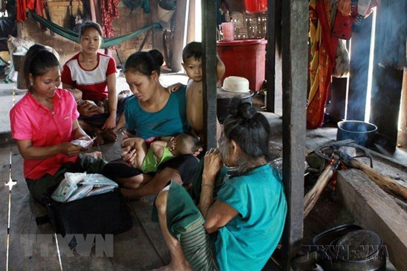 Đồng bào dân tộc vùng sâu, vùng xa ở huyện Minh Hóa, tỉnh Quảng Bình. (Ảnh: Dương Ngọc/TTXVN)