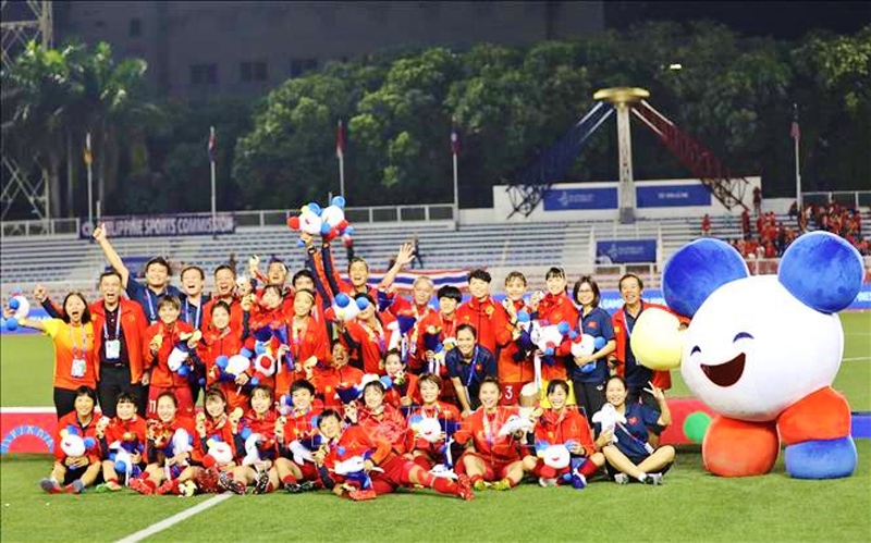 Bóng đá nam, nữ Việt Nam sẽ bảo vệ ngôi vô địch SEA Games tại kỳ Đại hội thể thao Đông Nam Á lần thứ 31 diễn ra trên sân nhà. Ảnh: TTXVN